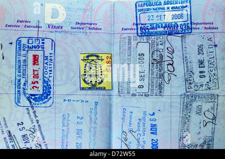 Closeup view of well used passport pages and stamps Stock Photo