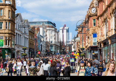 Crowded shopping street on a Saturday morning, Briggate, Leeds, West Yorkshire, UK Stock Photo