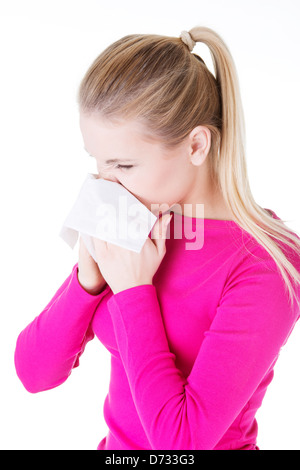 Teen woman with allergy or cold, isolated on white background Stock Photo