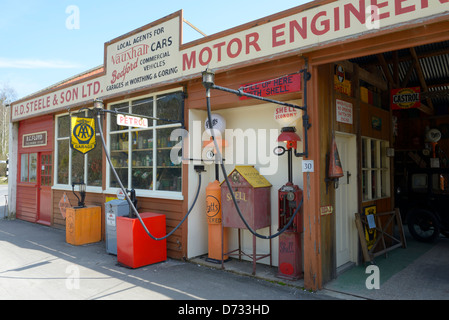 A village garage of around 1930 at the Amberley Working Museum, Amberley, West Sussex, UK Stock Photo