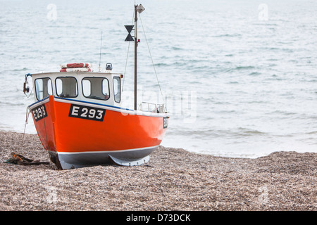 Coloured fishing boats on the beach of Etretat, Normandy, France Stock ...