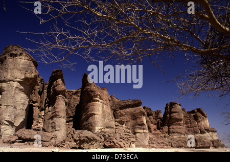 Sandstone cliffs featuring King Solomon's Pillars in Timna Valley located in southern Israel in the southwestern of the Arabah valley known in Hebrew as Arava or Aravah Stock Photo