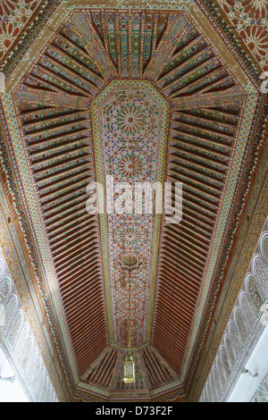 Marrakesh - the Bahia Palace. Painted cedarwood coffered and beamed ceiling with coved shape. Stock Photo