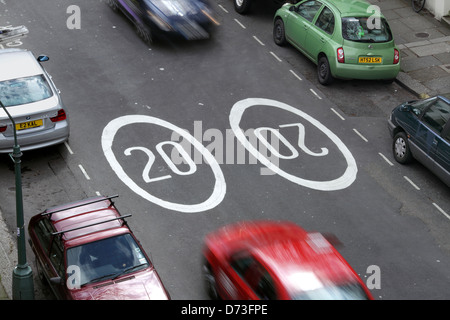 20 mph speed limit signs on a road in Hove, East Sussex. Stock Photo