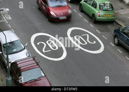 20 mph speed limit signs on a road in Hove, East Sussex. Stock Photo