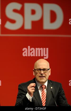 The Premier of Schleswig-Holstein, Torsten Albig, speaks during the SPD party conference in Buedelsdrof, Germany, 28 April 2013. Amongst other issues the conference was concered with the lists of candidates to run on the SPD's party ticket on state level for the forthcoming Bundestag parliamentary election in Autumn 2013. Photo:  Carsten Rehder Stock Photo