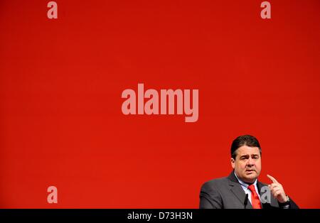 The chairman for the SPD, Sigmar Gabriel (SPD),   speaks during the SPD party conference in Buedelsdrof, Germany, 28 April 2013. Amongst other issues the conference was concered with the lists of candidates to run on the SPD's party ticket on state level for the forthcoming Bundestag parliamentary election in Autumn 2013. Photo:  Carsten Rehder Stock Photo