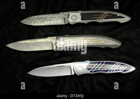 A series of pocket knifes, manufactured by craftsman Wilfried Gorski, are on display in his workshop in Solingen, Germany, 22 April 2013. Gorski manufactures hand-made pocket knifes for which collectors and knife enthusiasts pay several thousand euros. Photo: Marius Becker Stock Photo