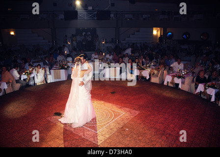 Bride and groom at their first dance on wedding reception (Greece) Stock Photo