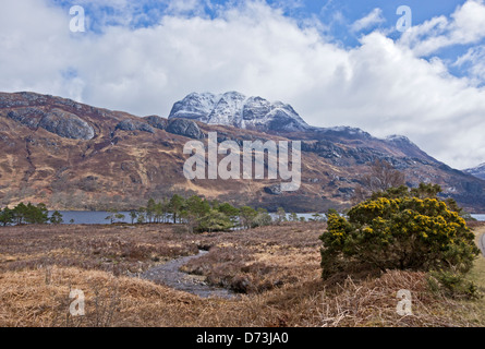 Changing April weather over Loch Maree in in Wester Ross Highland Scotland with mountain Slioch Stock Photo