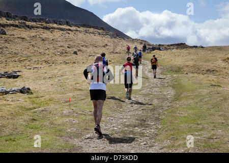 Yorkshire Three Peaks Challenge Saturday 27th April, 2013. The 59th Annual 3 Peaks Race with 1000 fell runners starting at the Playing Fields, Horton in Ribblesdale, Nr, Settle, UK.  Pen-y-Ghent is the first peak to be ascended then Whernside and finally the peak of Ingleborough. The race timed using the SPORTident Electronic Punching system Stock Photo