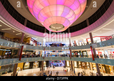 View of busy atrium at  Dubai Mall in United Arab Emirates UAE Stock Photo