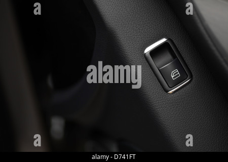 Detail on buttons controlling the windows in a car Stock Photo