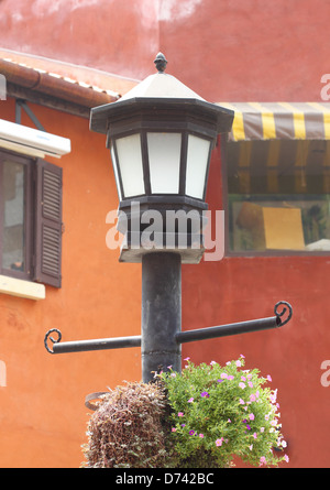 ancient street lamppost with one lamp black Stock Photo