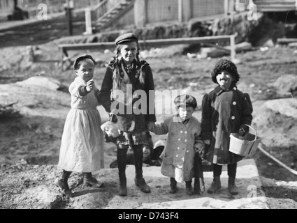 Thanksgiving Maskers - An old Thanksgiving tradition where children would dress up as hobos and go around begging for change, circa 1910 Stock Photo