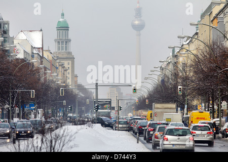 Berlin, Germany, car traffic on the snowy Karl-Marx-Allee Stock Photo