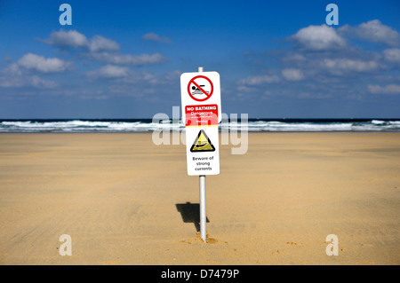 Warning sign for dangerous sea and strong currents Stock Photo
