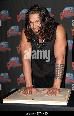 Jason Momoa promotes his starring role in 'Conan the Barbarian' with a hand print ceremony at Planet Hollywood in Times Square Stock Photo