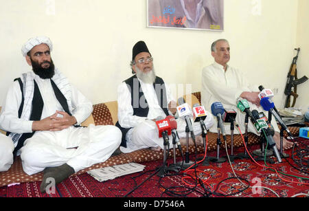 Jamhoori Watan Party President, Talal Ahmed Bugti along with Jamat-e-Islami (JI) Ameer, Syed Munawar Hassan address to media persons during press conference at Bugti House in Quetta on Monday, April 29, 2013. Stock Photo