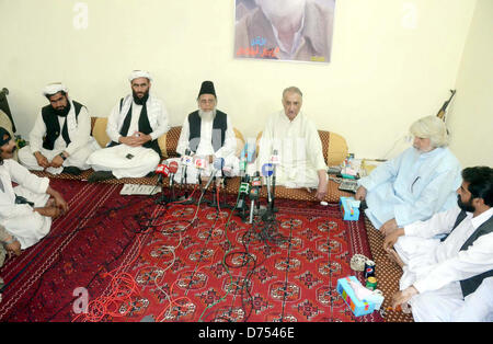 Jamhoori Watan Party President, Talal Ahmed Bugti along with Jamat-e-Islami (JI) Ameer, Syed Munawar Hassan address to media persons during press conference at Bugti House in Quetta on Monday, April 29, 2013. Stock Photo