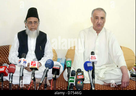 Jamhoori Watan Party President, Talal Ahmed Bugti along with Jamat-e-Islami (JI) Ameer, Syed Munawar Hassan address to media persons during press conference at Bugti House in Quetta on Monday, April 29, 2013. Stock Photo