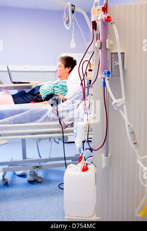 Haemodialysis. Patient undergoing haemodialysis treatment. Limoges hospital, France. Stock Photo