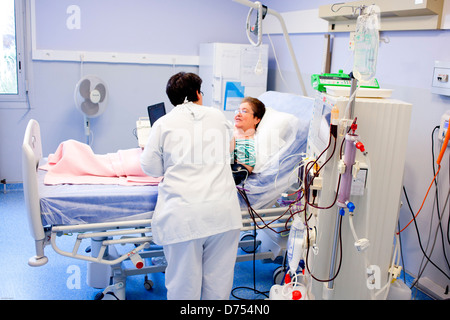 Haemodialysis. Patient undergoing haemodialysis treatment. Limoges hospital, France. Stock Photo