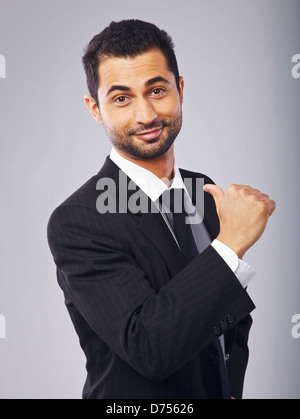 Proud young professional pointing to himself Stock Photo