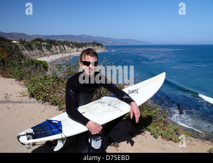 Surfer at Point Dume State Reserve in Malibu Stock Photo