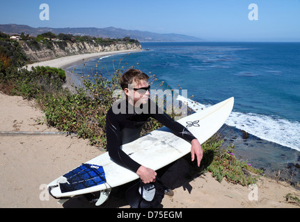 Surfer at Point Dume State Reserve in Malibu Stock Photo