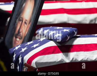 US flag draped over casket along with photo of firefighter who died in West, Texas fertilizer plant explosion Stock Photo