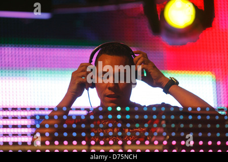 Dutch musician DJ Tiesto performs during a live event in the Spanish Balearic island of Ibiza. Stock Photo