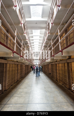 SAN FRANCISCO, California - Inside the cell block where the inmate's cells were in Alcatraz prison on Alcatraz Island in San Francisco Bay. Known for its notorious inmates and rumored inescapability, Alcatraz now serves as a significant tourist attraction and National Park Service site, providing insight into the prison system and historic events of the 20th century. Stock Photo