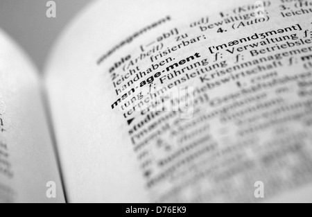 Management definition in English German dictionary Stock Photo