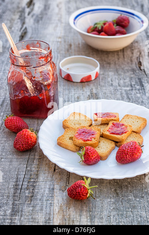 Strawberry compote with strawberries and toasted sandwich Stock Photo