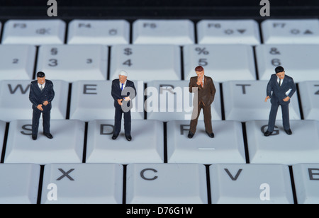 Miniature figures keyboard computer Stock Photo