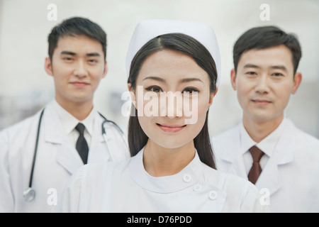 Portrait of Healthcare workers in China, Two Doctors and Nurse Stock Photo