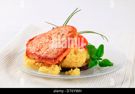 Marinated pork served with couscous