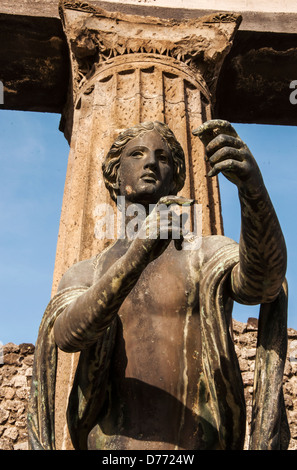 bronze statue inside the pompeii ruins, italy Stock Photo