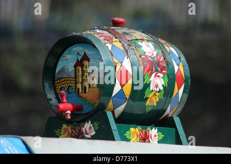 Painted canal ware barrel on traditional narrowboat or barge, Regents Canal, London. Stock Photo