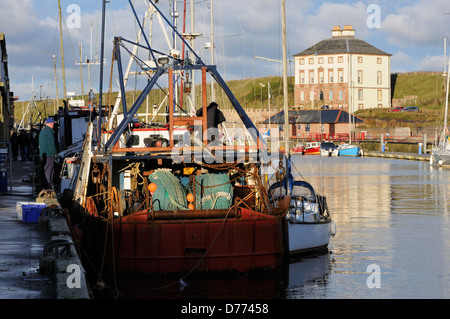 Eyemouth harbour and Gunsgreen House Stock Photo