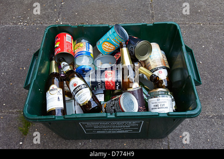 Recycling Bin full of Tin Cans and Glass bottles Stock Photo - Alamy