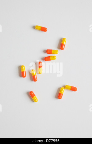 colorful pills in orange and yellow Stock Photo
