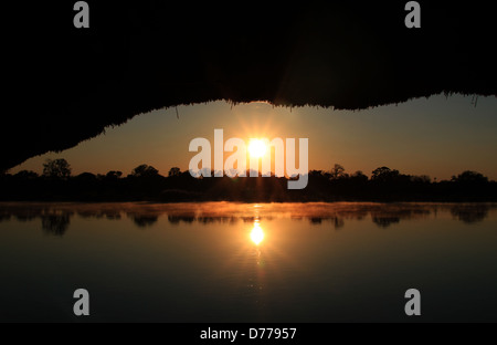 Sunrise Over Okavango River, Okavango Delta, Botswana Stock Photo