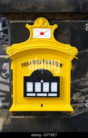 Yellow German Mailbox Stock Photo