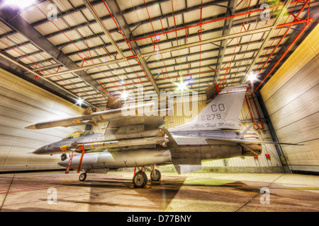 F-16 Alert Jet in Hangar Loaded Live Weapons Low Side View High Dynamic Range or HDR Image Stock Photo