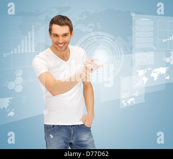 man touching virtual screen Stock Photo