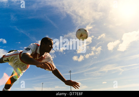 Soccer player alone with ball, shot on goal, header, , Miami Stock Photo