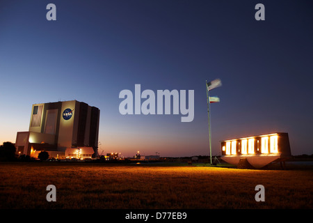 Launch countdown clock American Space Shuttle Endeavour Flags Vehicle Assembly Building as seen press site Launch Complex 39 Stock Photo