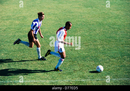 Soccer game, caucasion and Black players, on field, in competition, Miami Stock Photo